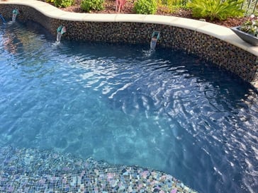 black bottom pool in daylight