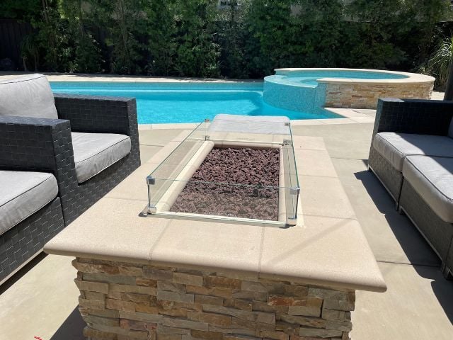 Fire Features for Your Pool: Cost, Safety, and how to choose the right one