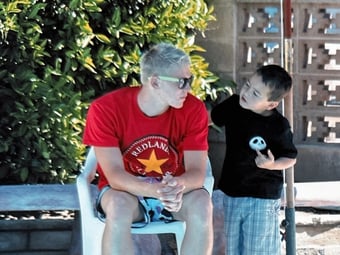 kid talking to a lifeguard