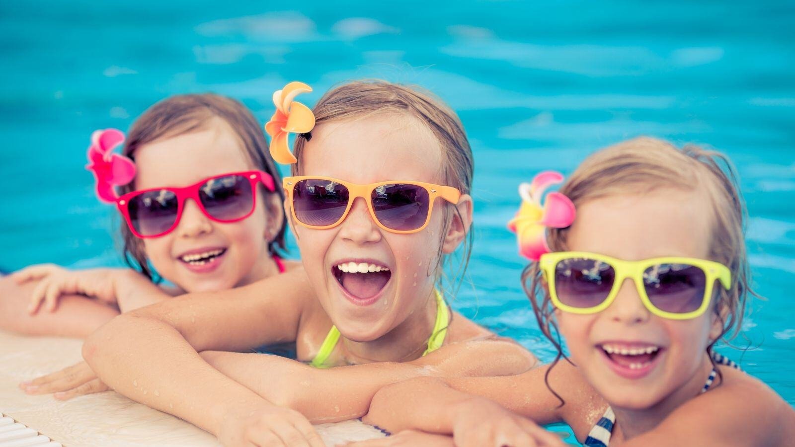 three girls in a pool