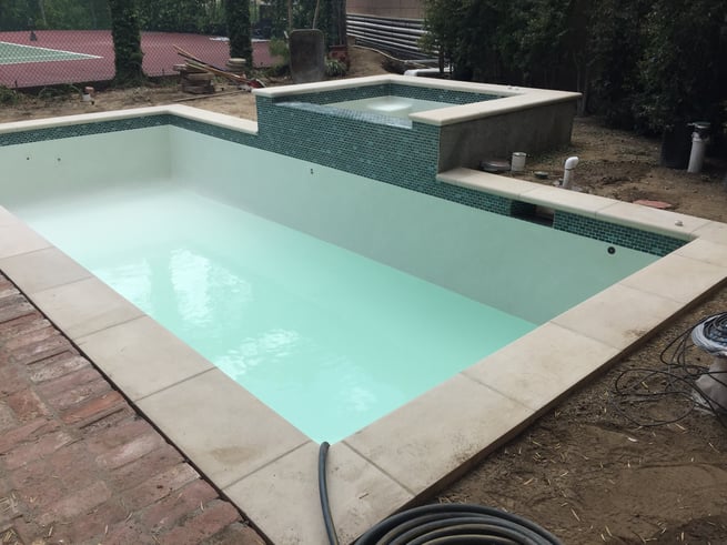 Pool recently plastered in the process of filling