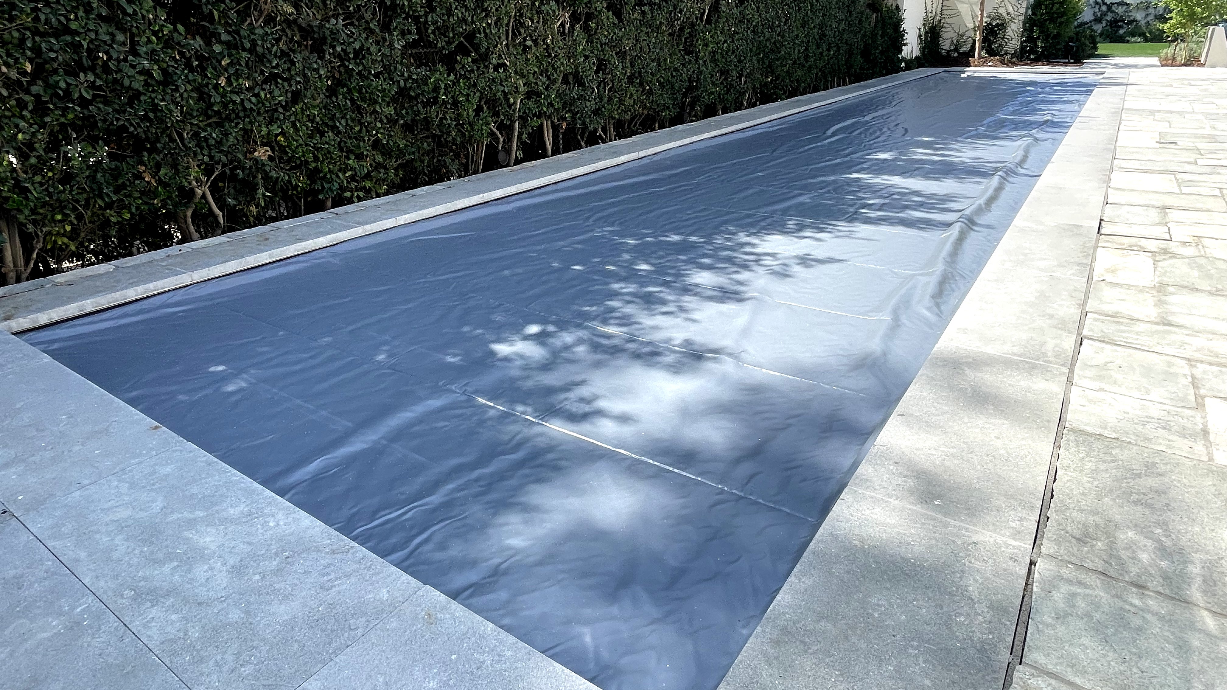 Backyard automatic pool cover